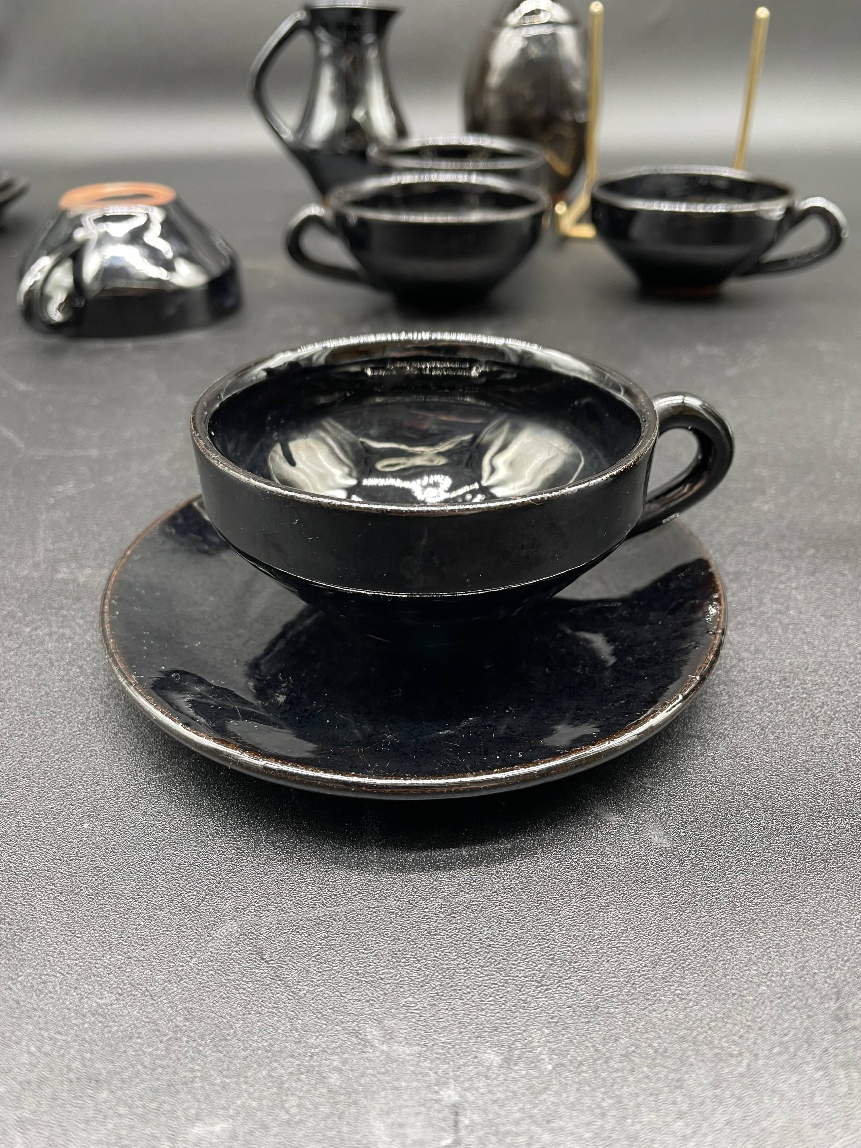 Brutalist black ceramic coffee service – Modernist design