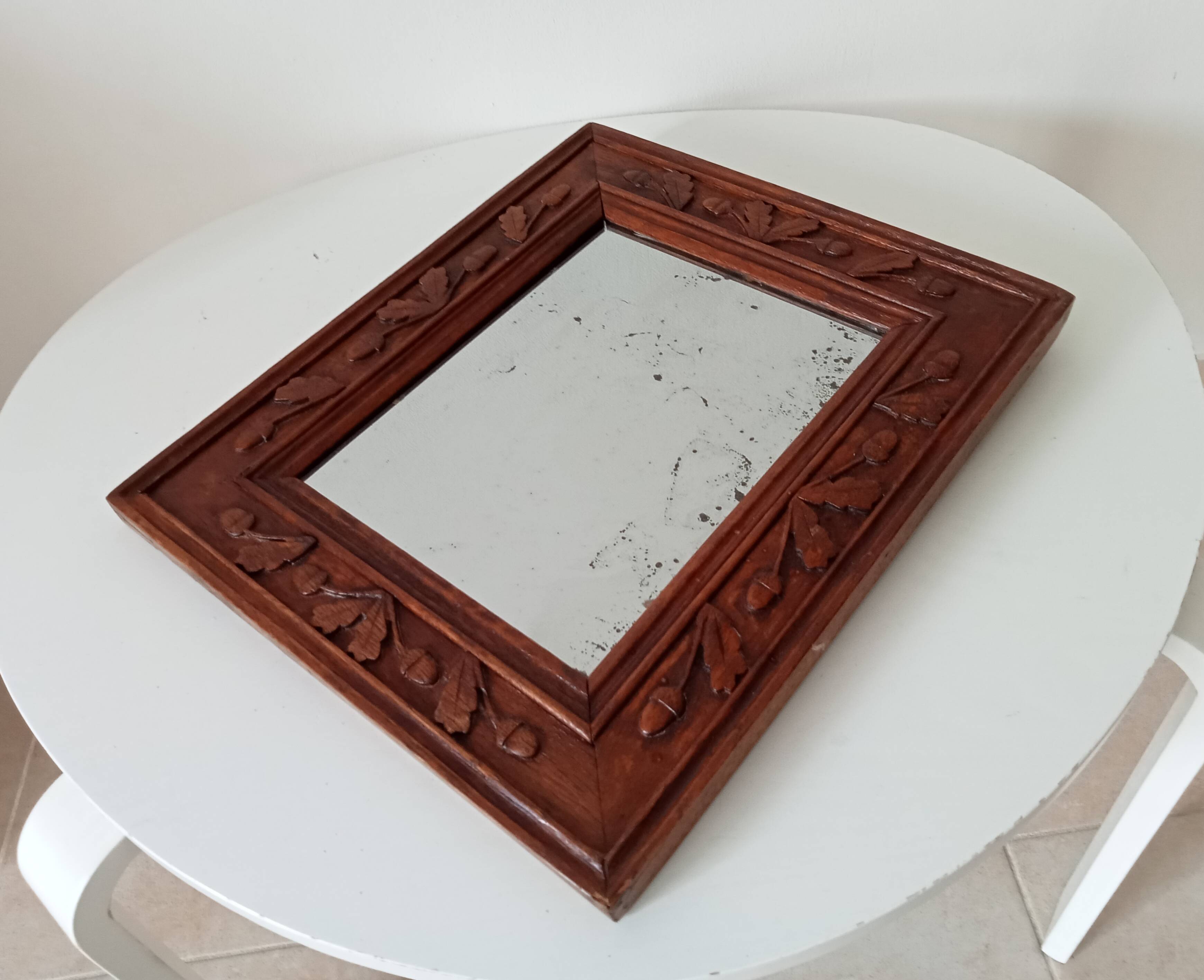 Antique mirror in carved wood