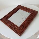 Antique mirror in carved wood