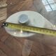 Dining table with glass top and marble base, Ligne Roset.