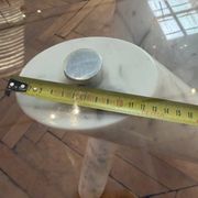 Dining table with glass top and marble base, Ligne Roset.