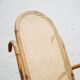 Fauteuil à bascule vintage en rotin et cannage