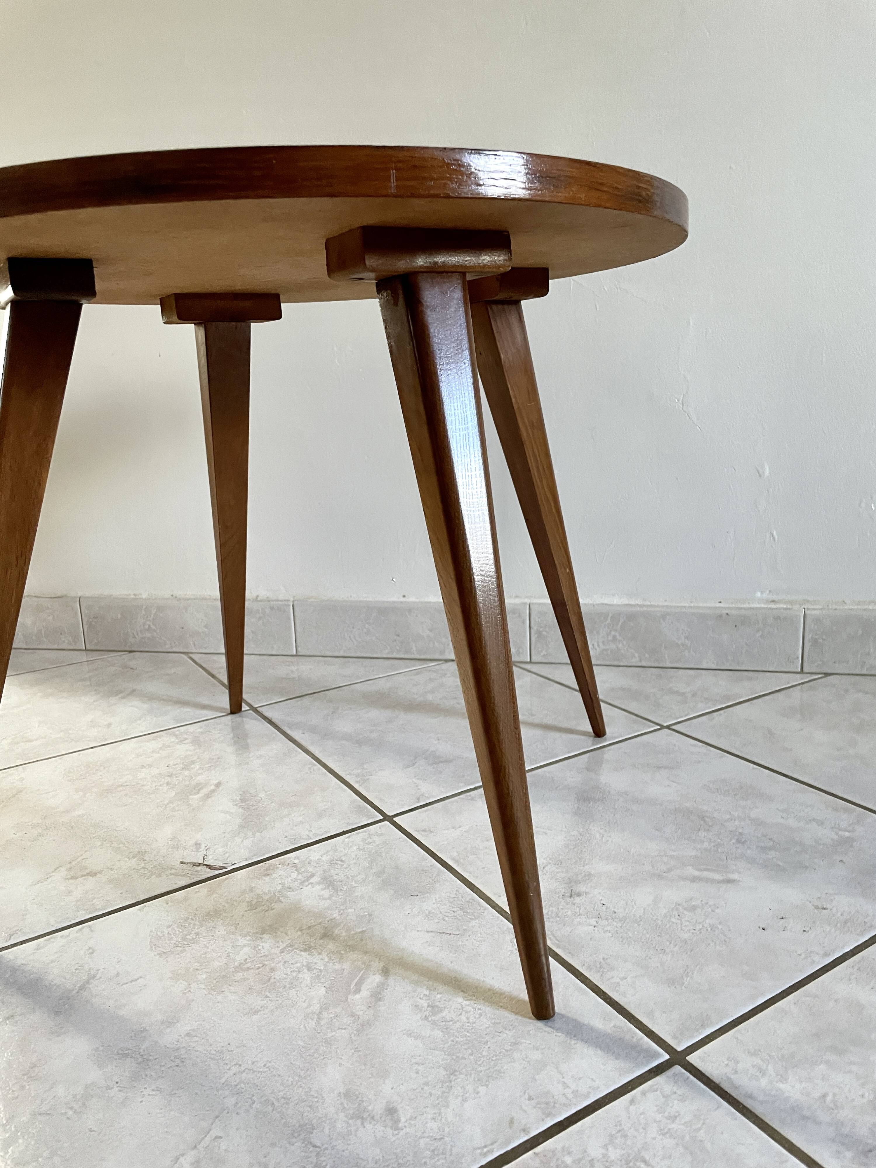 Round coffee table with compass legs 1970