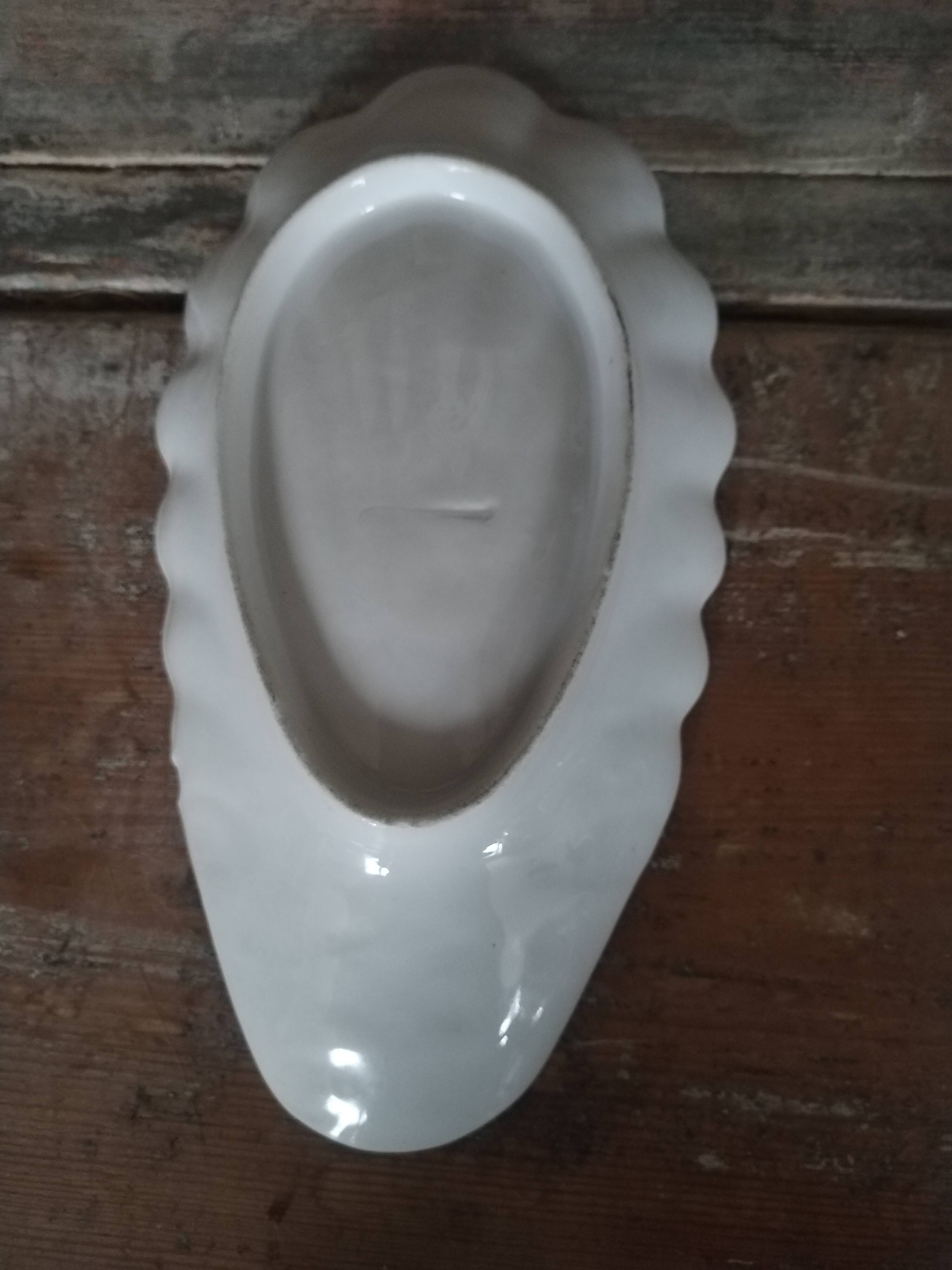 Pair of white earthenware shells 19th