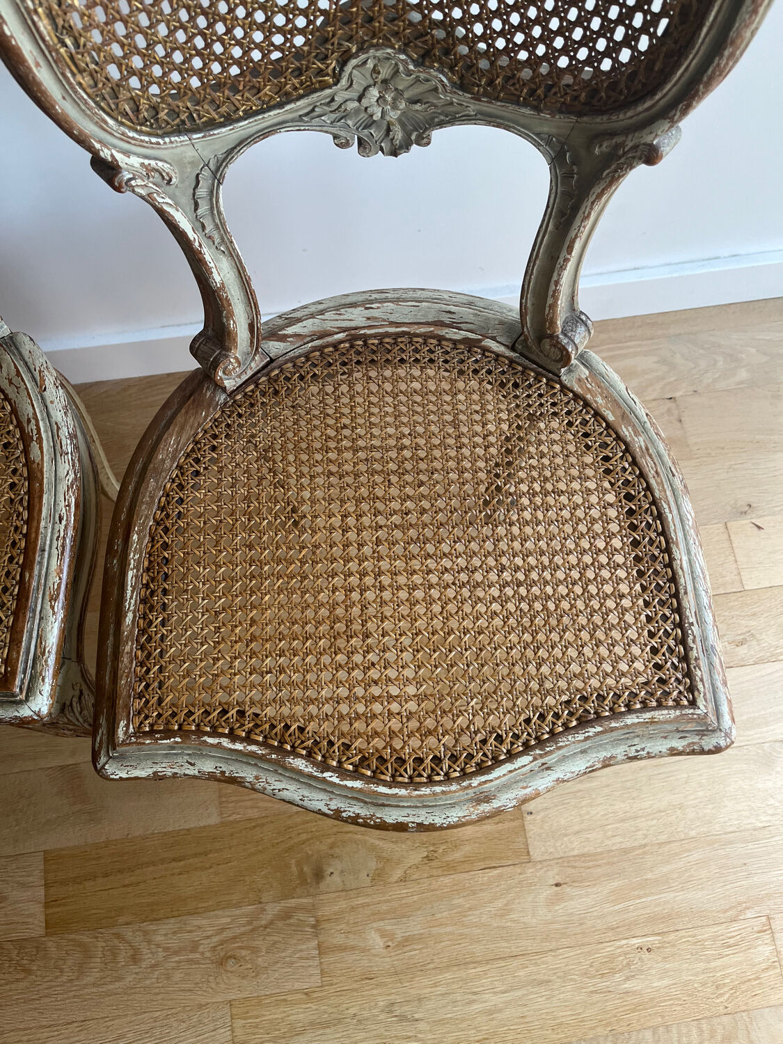 2 caned chairs in Louis XV Regency style