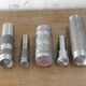 Set of 5 brutalist steel vases