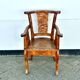 Hand stabbed teak armchair