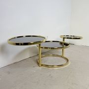Table basse à cascade pivotante Hollywood Regency vintage avec verre noir