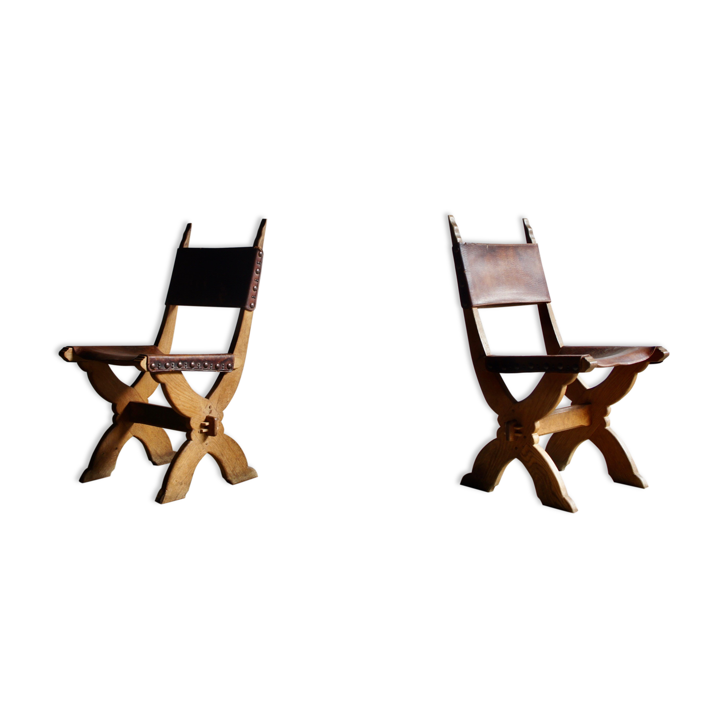 Pair of gothic style leather chairs