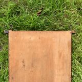 Old carved wooden medicine cabinet with beveled mirror