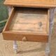 Antique drawer table with a patina.