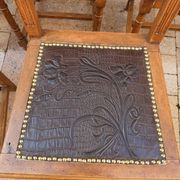 Set of 6 antique turned wooden chairs with embossed leather seats.
