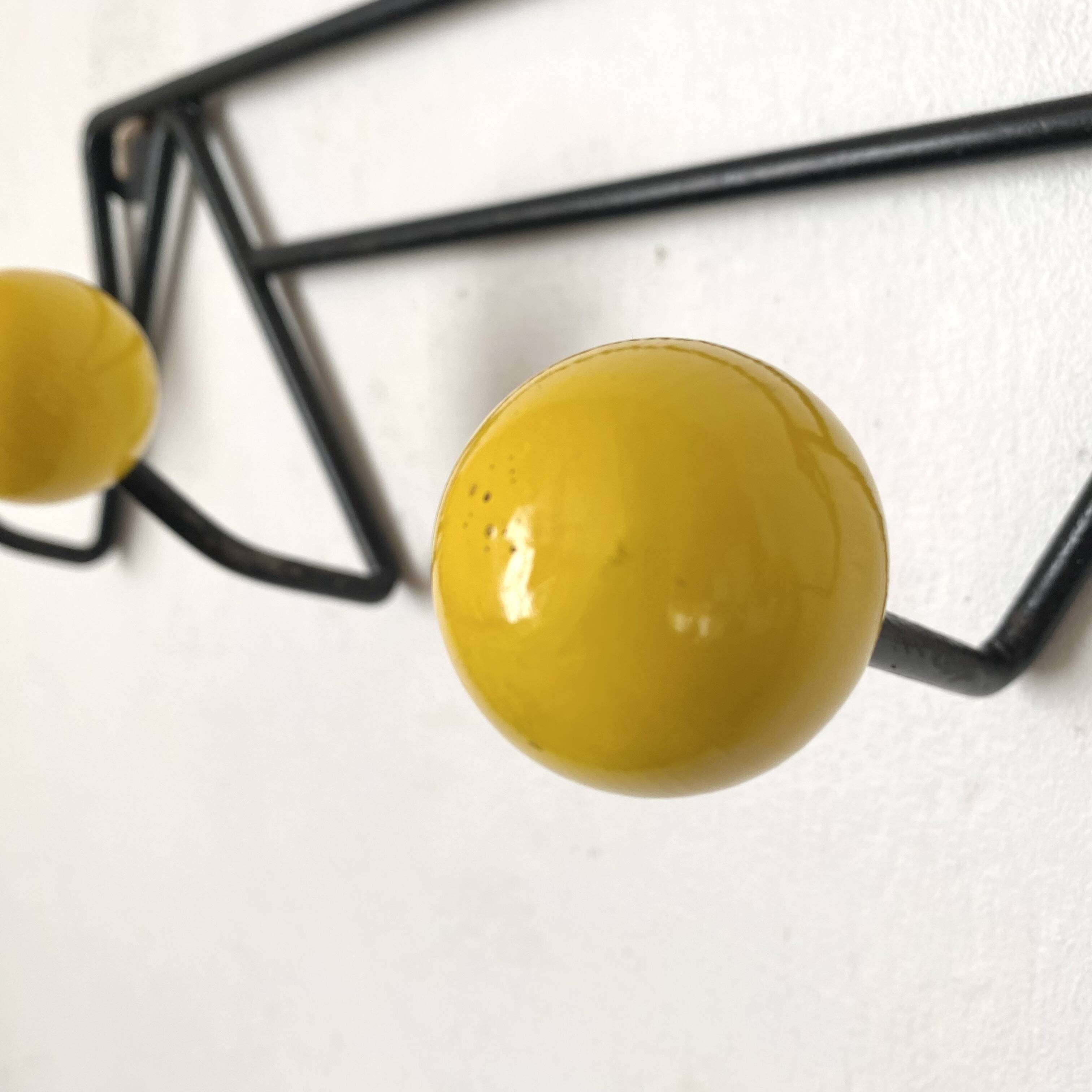 Vintage coat rack with ball hooks in Feraud style.