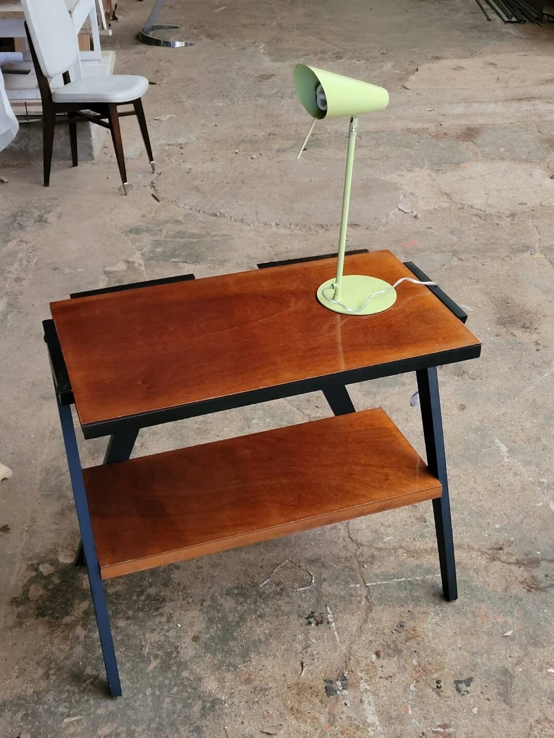 Vintage console design, sleek from the 1960s-70s.