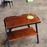 Vintage console design, sleek from the 1960s-70s.