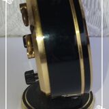 Jaz clock of black round mechanical travel, 60s/70s