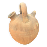 Old terracotta jug called "Gargoulette"