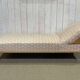 English daybed from the early 20th century in oak, some stains on the fabric