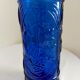 cobalt blue molded glass bottle in relief decoration bunches of grapes