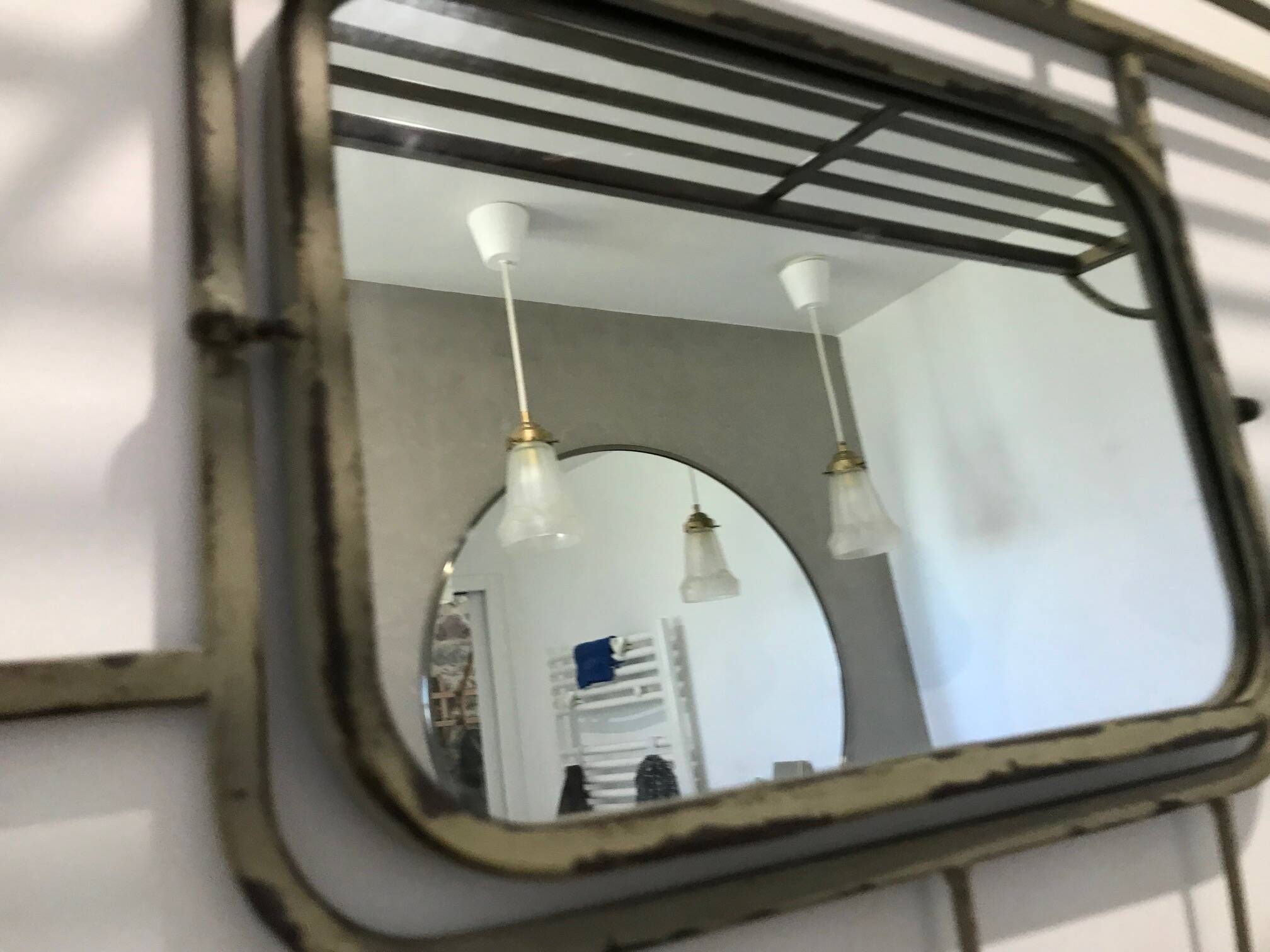 Gray-green patinated metal hat rack