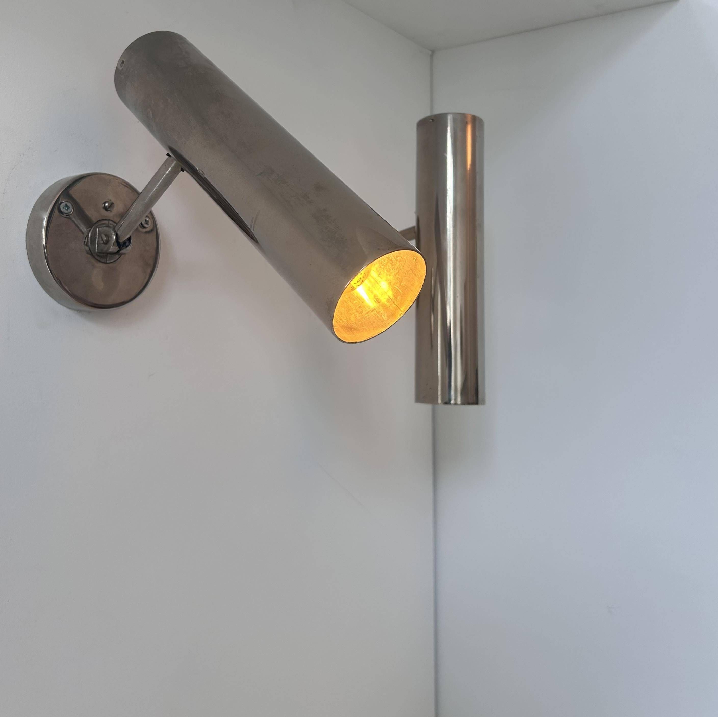 Pair of modernist adjustable wall lights, chrome metal, France 1960