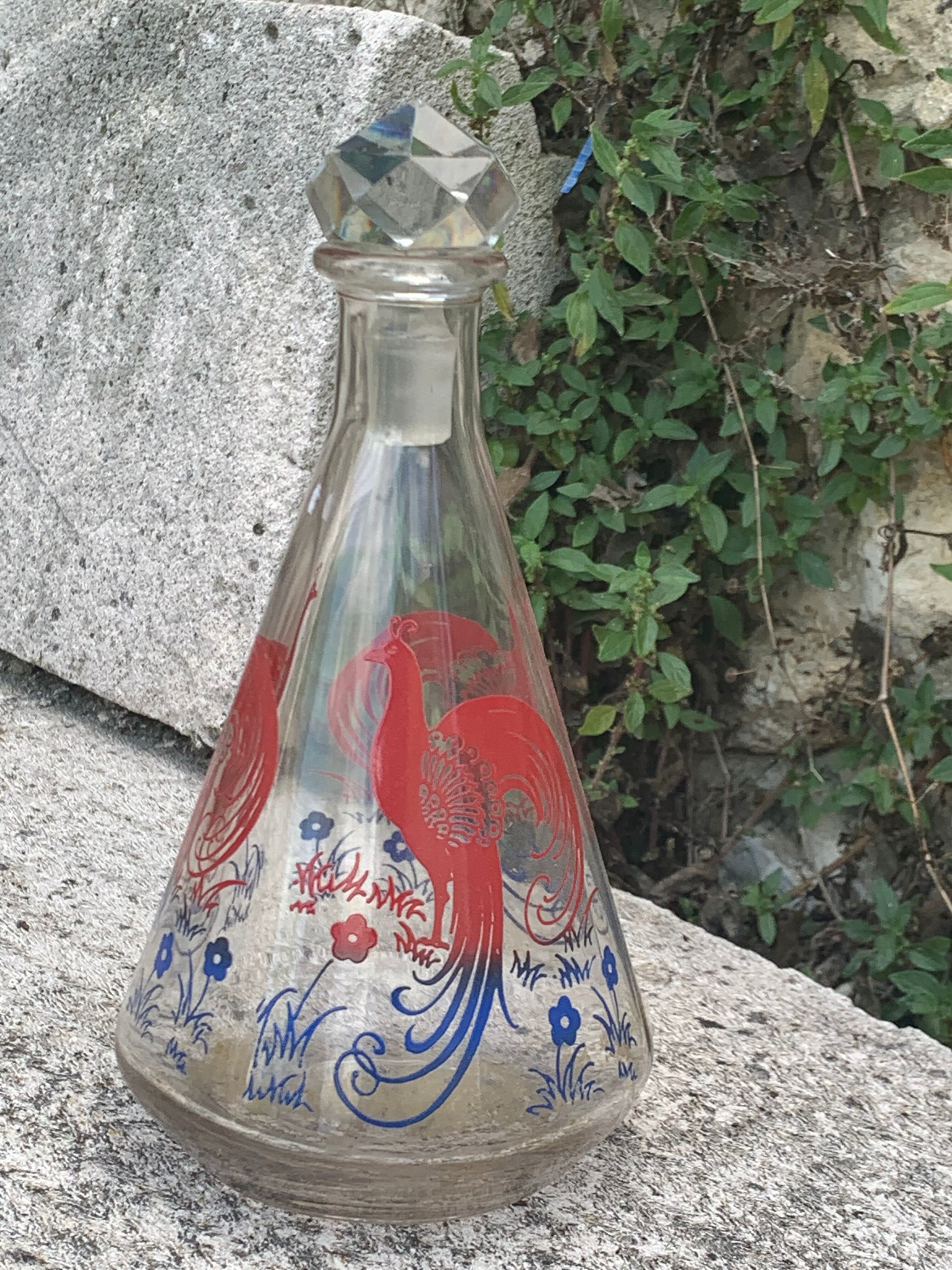 Peacock pattern liqueur decanter and 4 small vintage cobalt blue glasses
