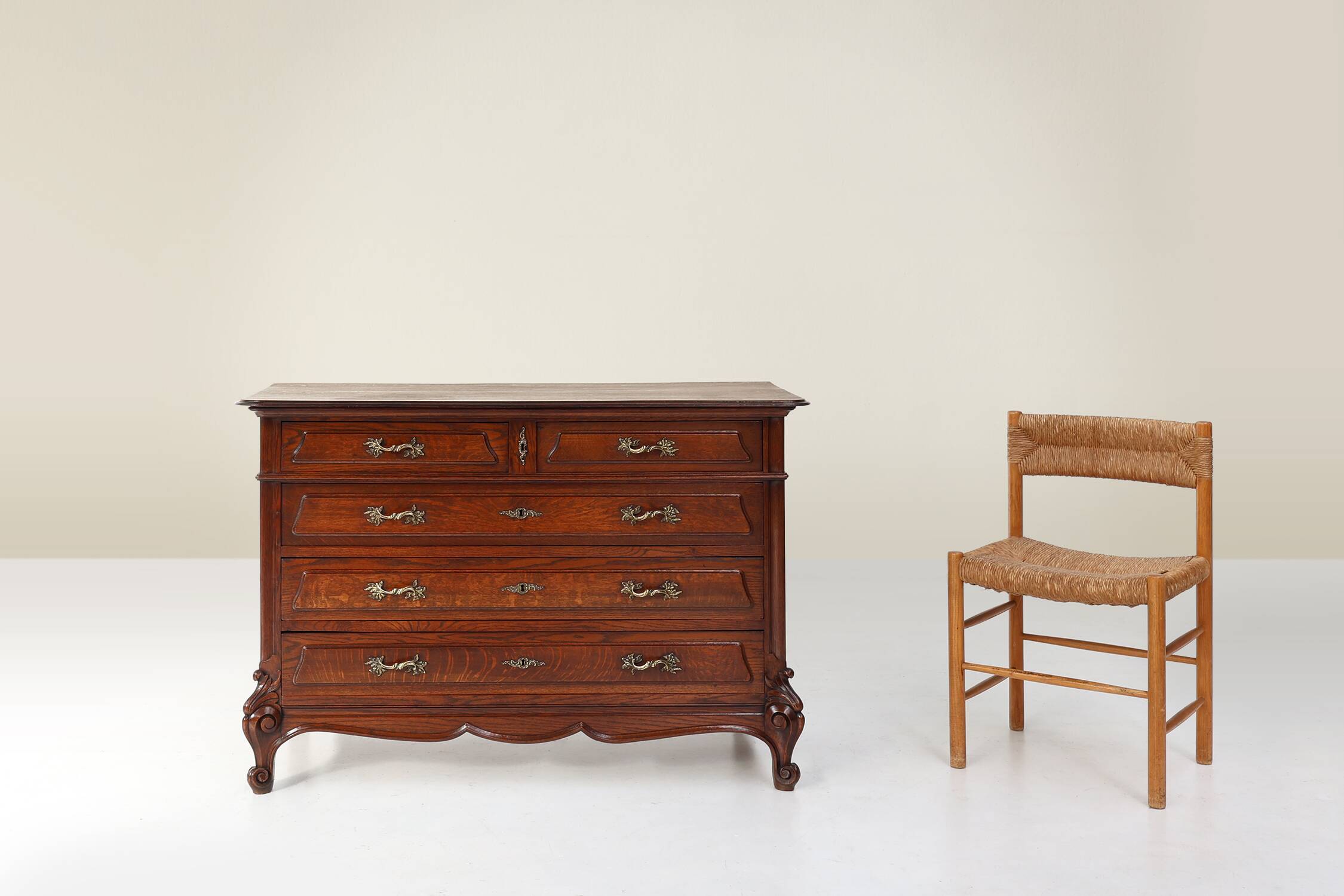French Antique carved oak chest of drawers