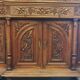 Art Nouveau buffet in carved oak with vine decoration
