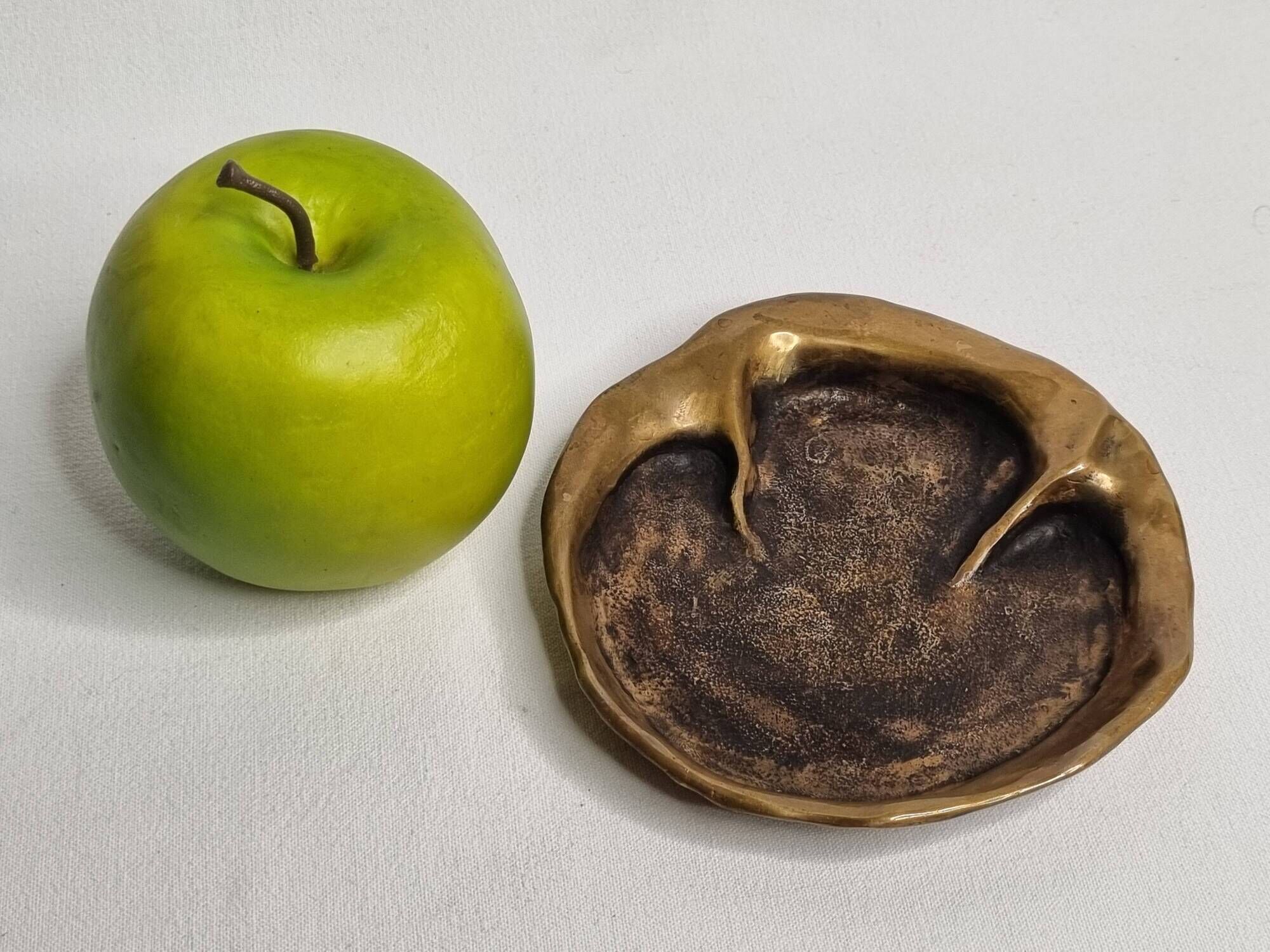 Bronze pocket emptier by Denis Mathews (1913-1997), "Rhinoceros Footprint" (12 cm), 1995