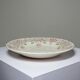 Antique Longchamp service shallow dish with polychrome daisies, ironstone, 19th century.