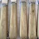 Set of 11 Apollonox table knives in a box
