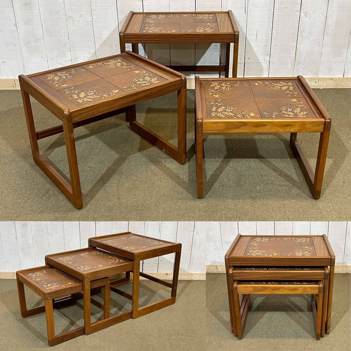 Set of 3 nesting tables in teak with tiled tops.