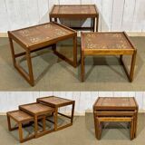 Set of 3 nesting tables in teak with tiled tops.