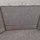 Metal fireplace screen
