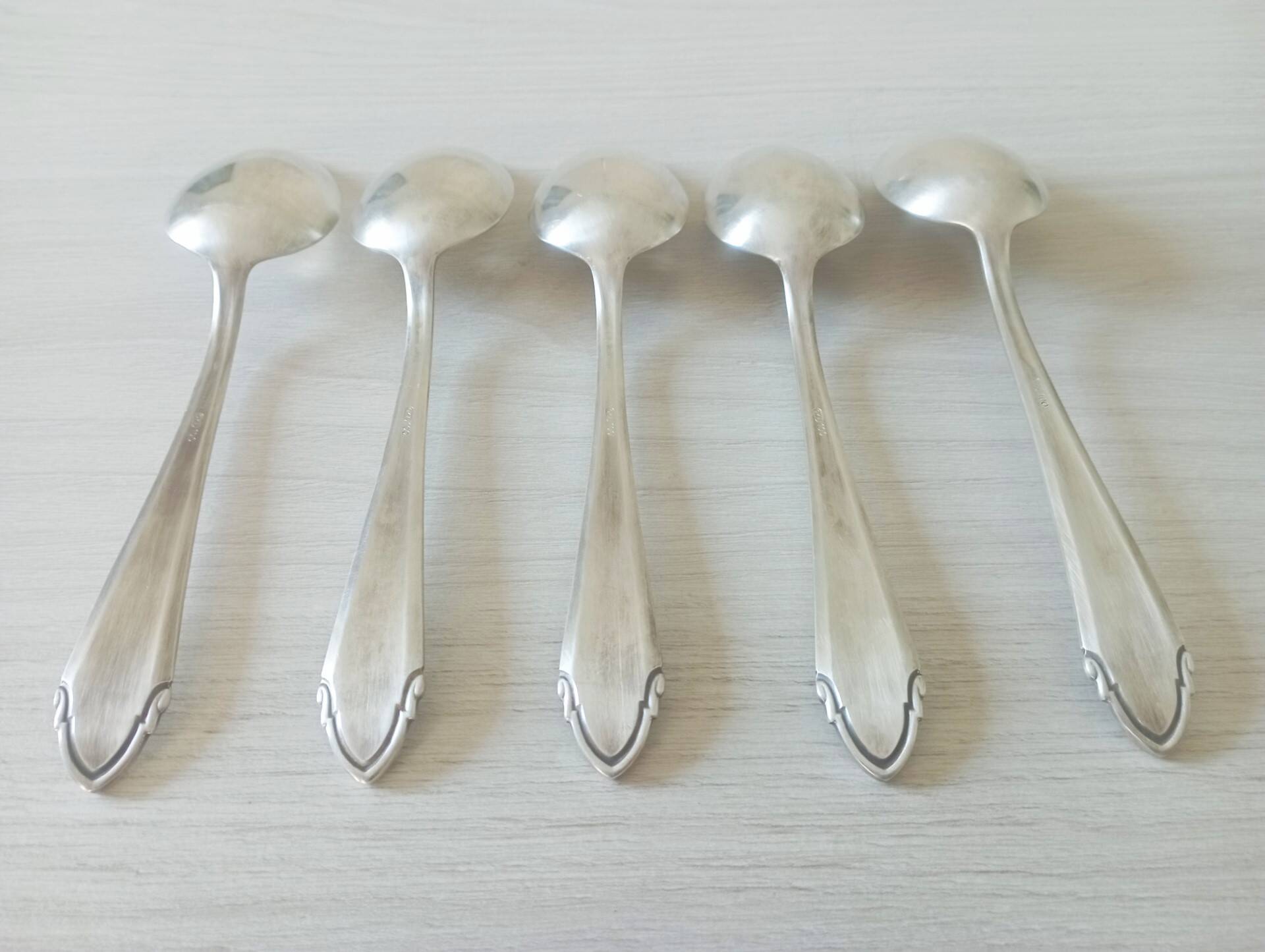 Set of 5 large silver metal spoons