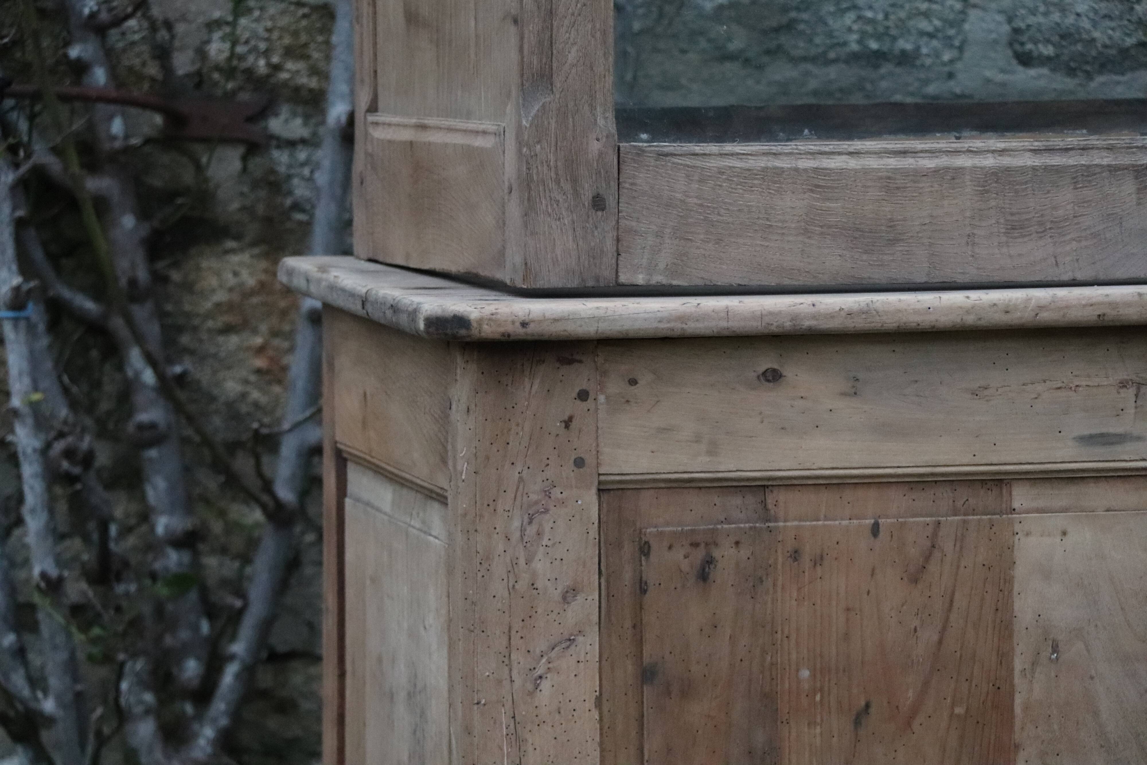 Comptoir vitrine chapellerie 1930