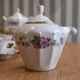 Coffee and tea service in Limoges porcelain with anemone flower pattern and gilding.