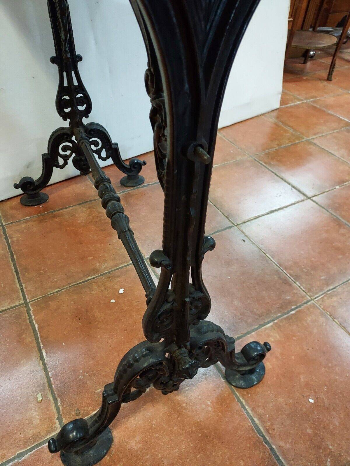 bistro table with cast iron base and marble top