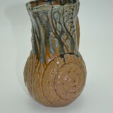 Sandstone pitcher decorated with coils
