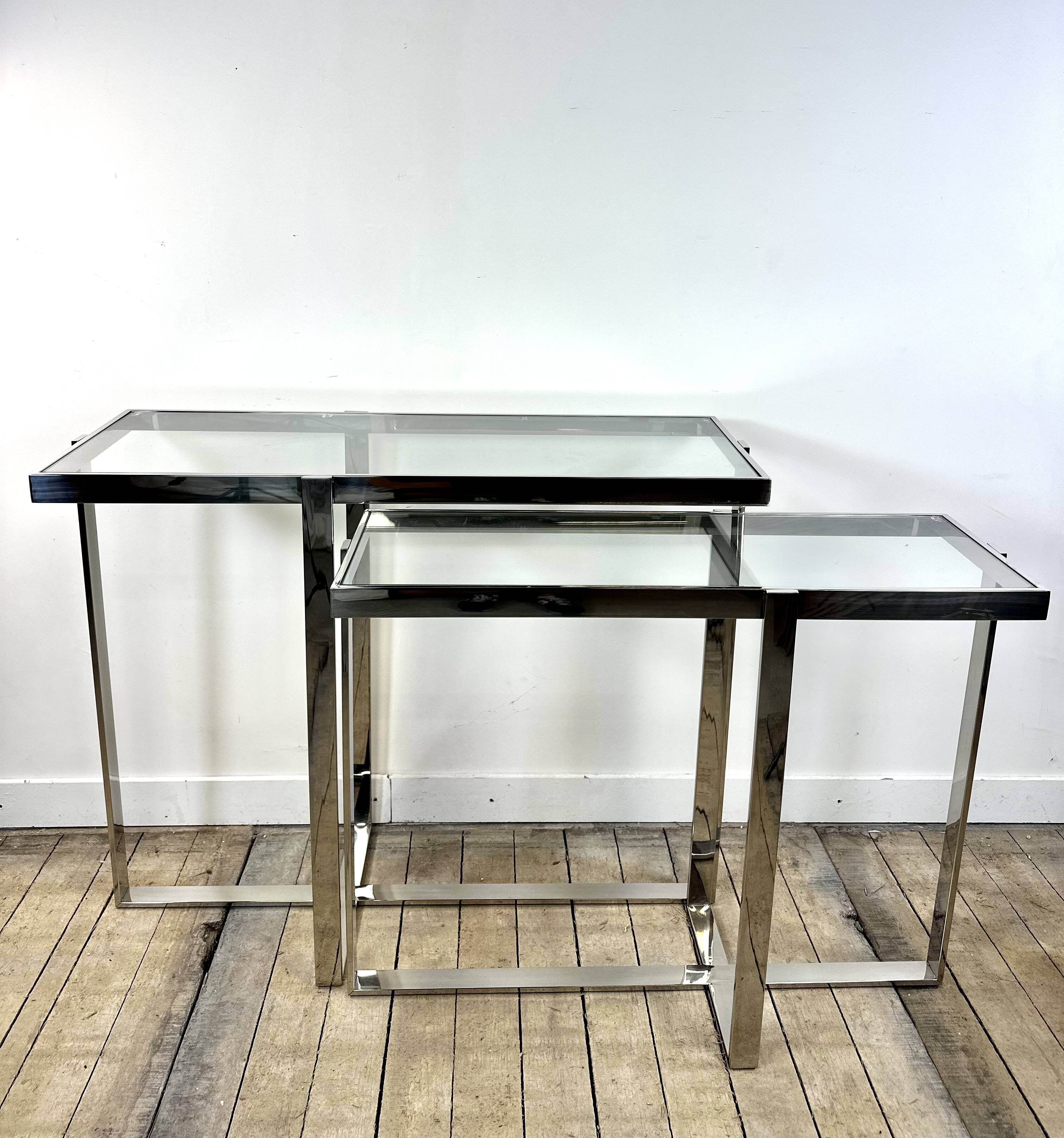 Chrome metal and glass console from the 2000s.
