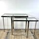 Chrome metal and glass console from the 2000s.