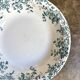 Plat rond creux St Amand & Hamage en terre de fer, service "Campanule"