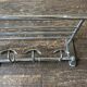 1950s chrome bathroom coat rack with shelf