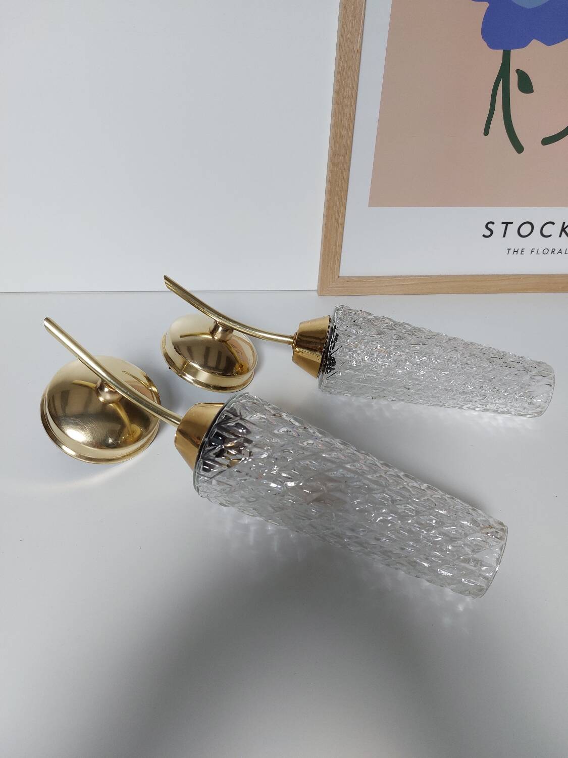 Pair of brass and glass wall lights