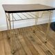 Rolling table vinyl row in formica and gold metal years 60-70