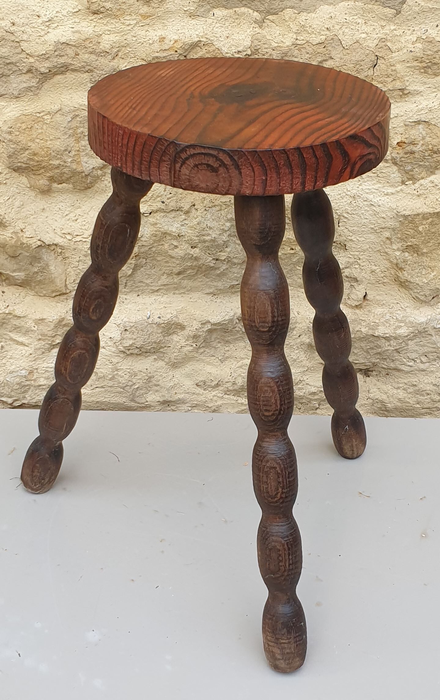 Vintage solid wooden tripod stool