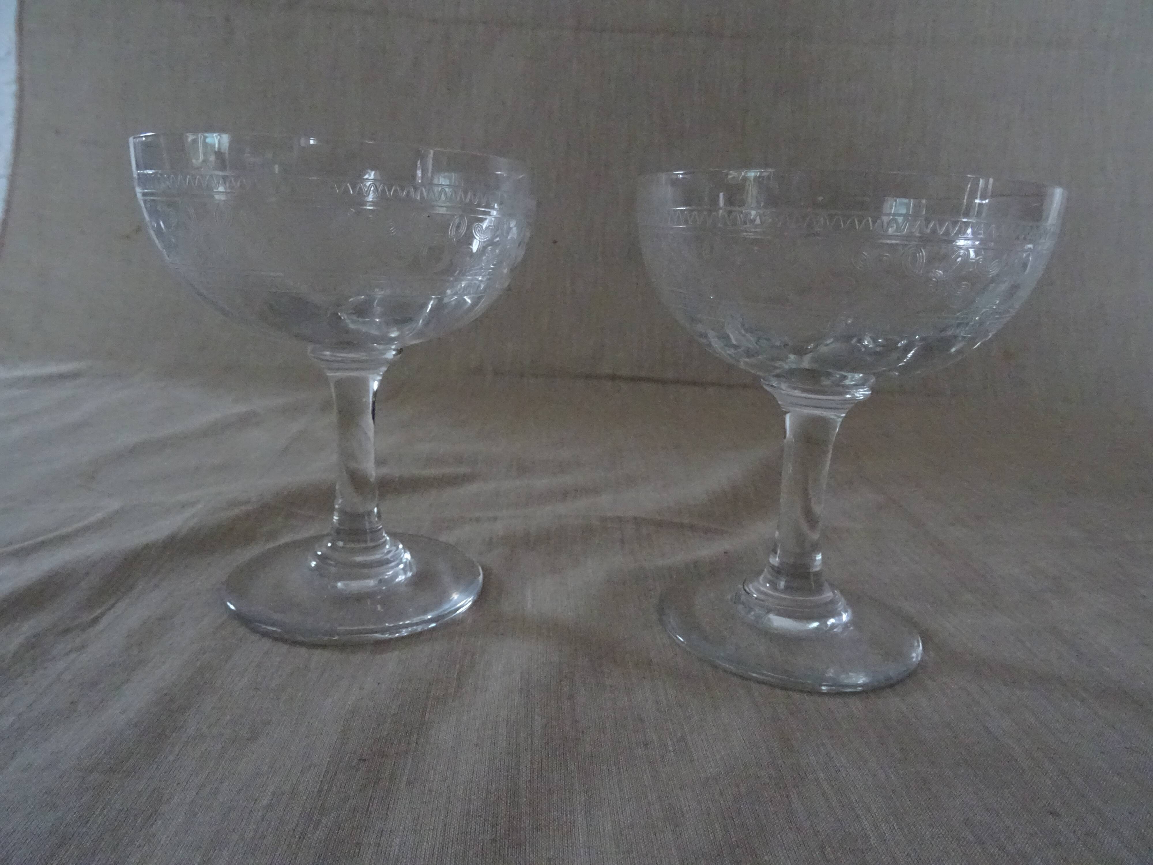 Pair of old crystal champagne glasses wide frieze right foot