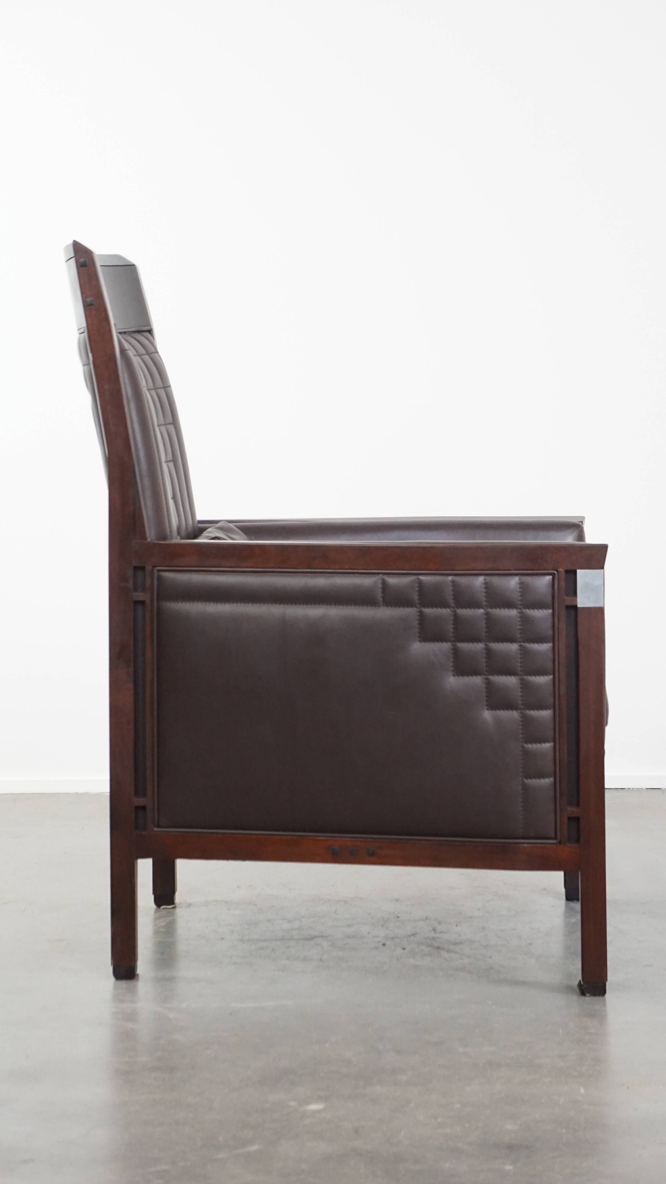 Art Deco armchair with dark brown leather