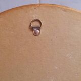 Round golden mirror