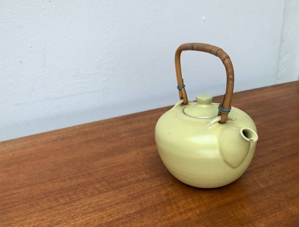 Mid-century ceramic teapot with bamboo handle, 1960s.